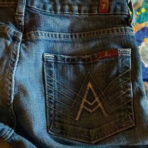 A Pocket 7 for all mankind  -vintage. Size 27 ( run on the small side of 27)